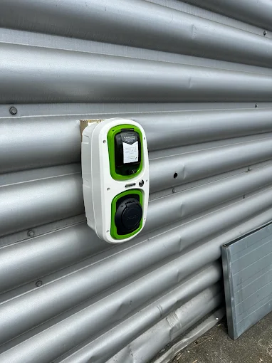 Car charge port on shutter