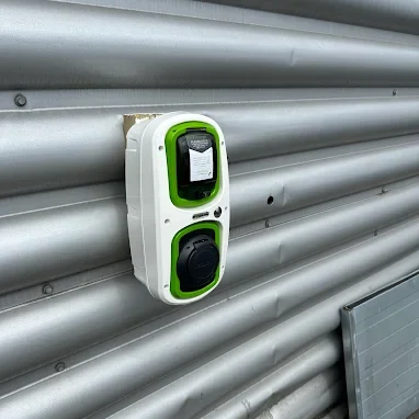 Car charge port on shutter